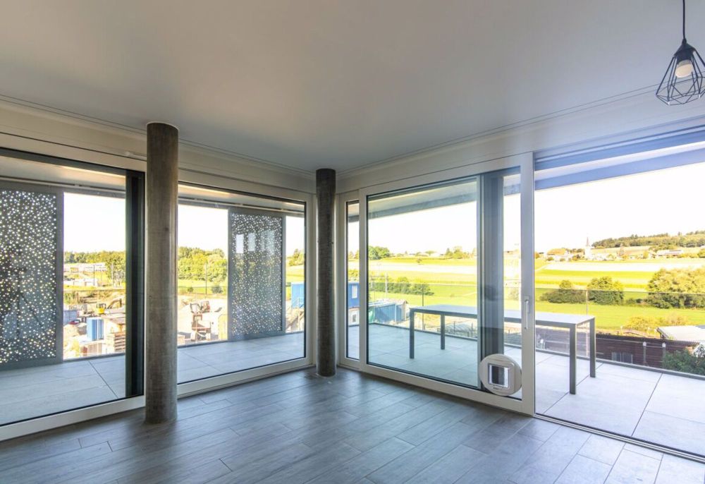 Schönes 3.5-Zimmer-Apartment mit Südwestausrichtung und Blick auf Billens - Bild 1