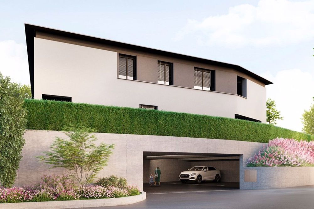 Nuova costruzione di tre case unifamiliari vicino a Lugano - Bild 1