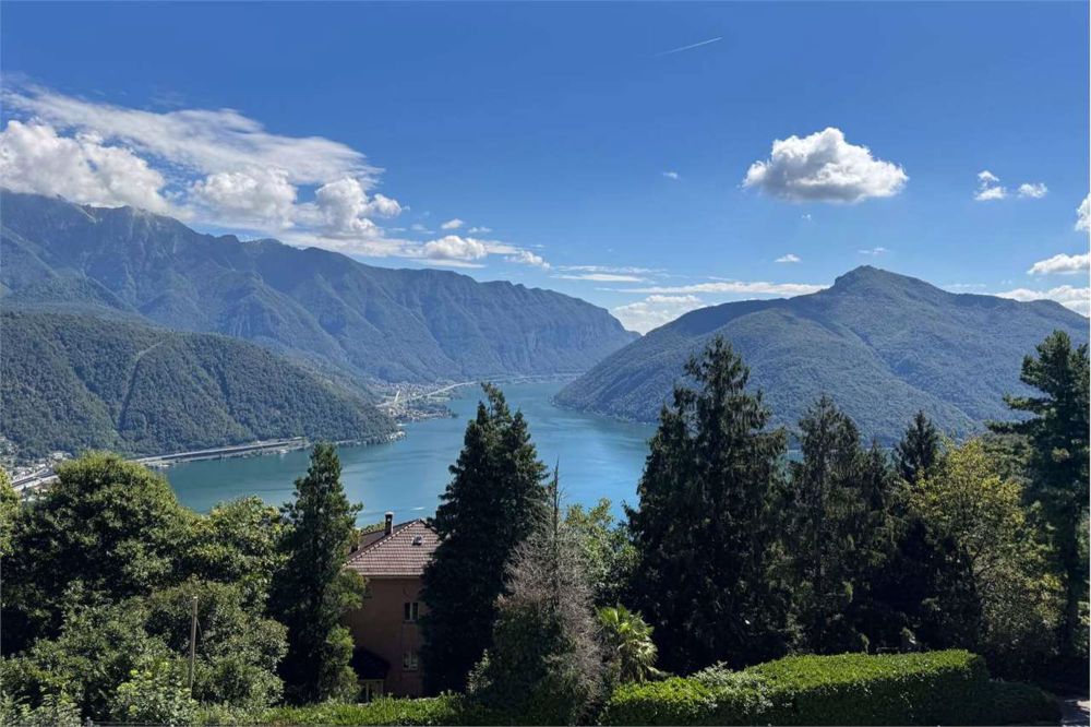 Raffinierte 4.5-Zimmer-Wohnung mit Seeblick in exklusiver Residenz - Bild 1