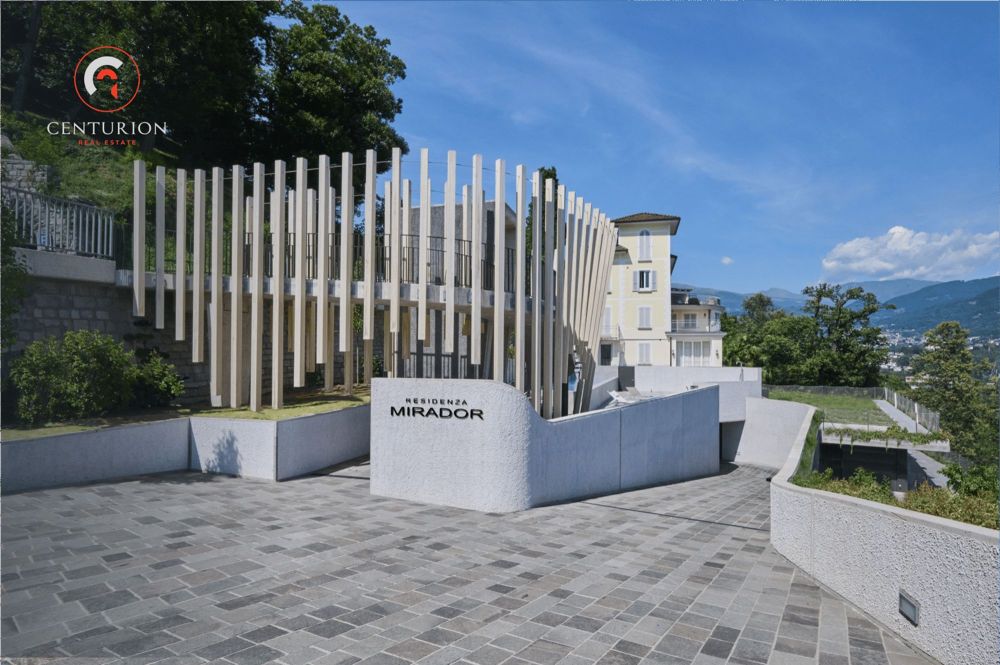 Elegante e moderno appartamento 2.5 con vista lago e giardino privato - Bild 2