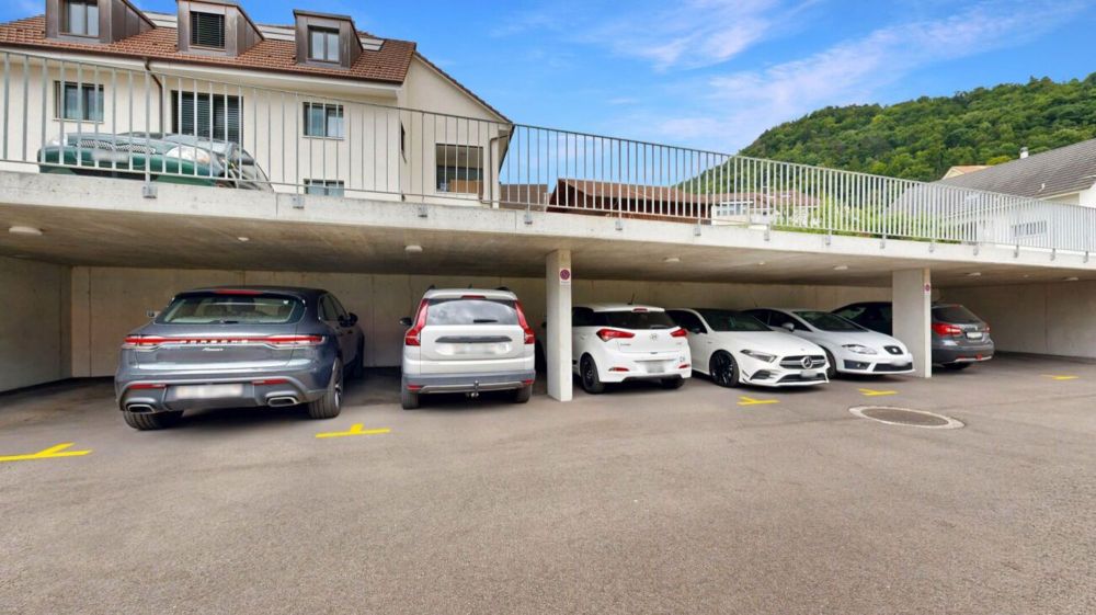 moderne 3.5-Zimmerwohnung mit eigenem Waschturm und Carport - Bild 11