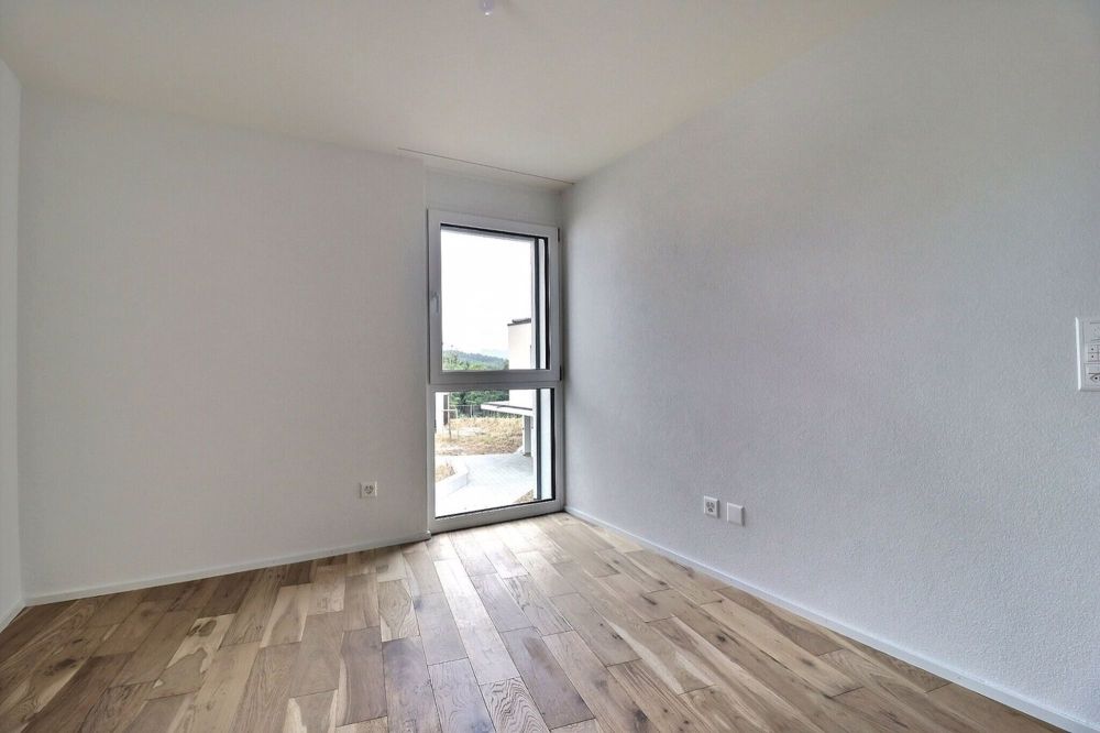 Bel appartement de 4.5 pièces Rooftop / 2 places de parc intérieures - Une des deux autres chambres