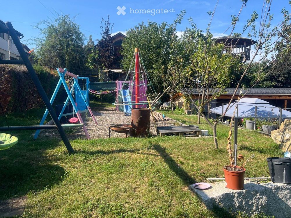 Modernes Einfamilienhaus mit Einliegerstudio und Traumgarten - Bild 5