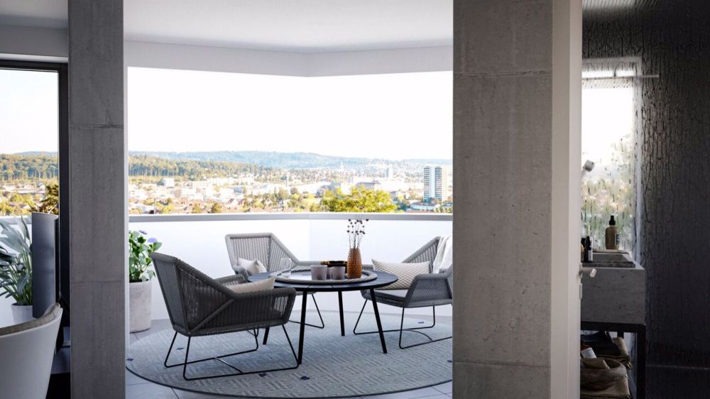 COSMO WOHNUNGEN | URBANES LEBEN IN BIEL - Terrasse mit Panoramablick bei Tag