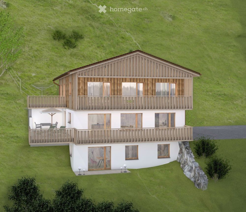 Einfamilienhaus mit Einliegerwohnung und atemberaubendem Bergblick in Serneus - Bild 1