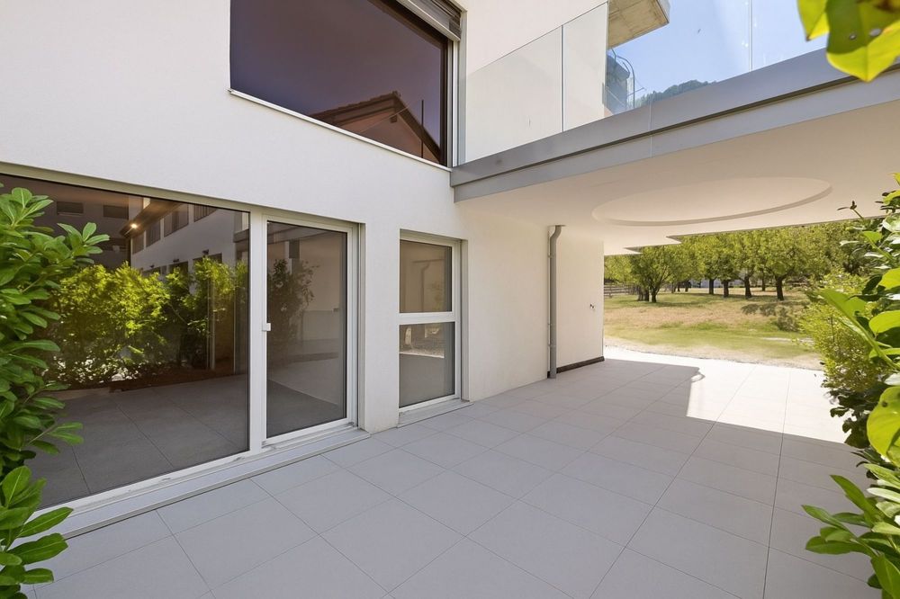 Appartement neuf de 2.5 pièces avec grand jardin et terrasses - Bild 2
