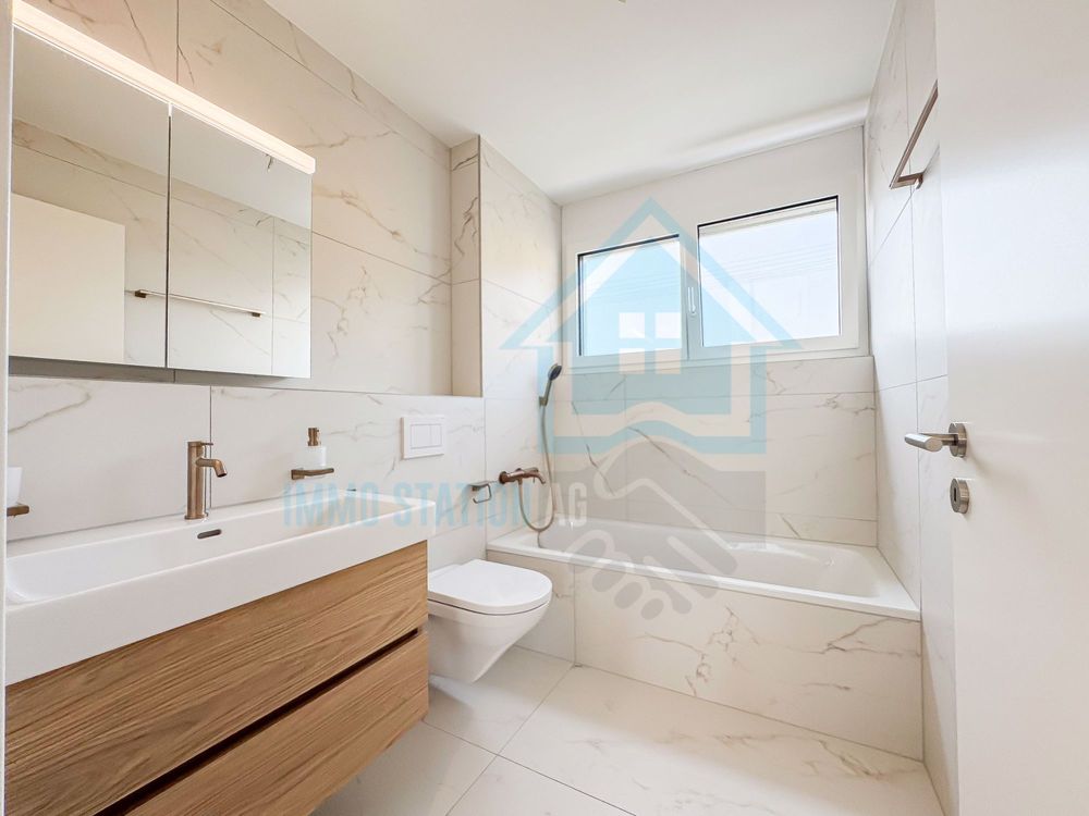 Exklusive 3.5-Zimmer-Neubau Gartenwohnung - modern, hell und zentral - Bad/WC (Musterbilder)