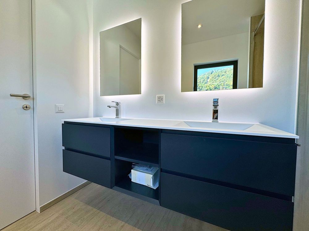 Elegante 4.5 locali al primo piano con terrazza e parziale vista lago - Bild 9