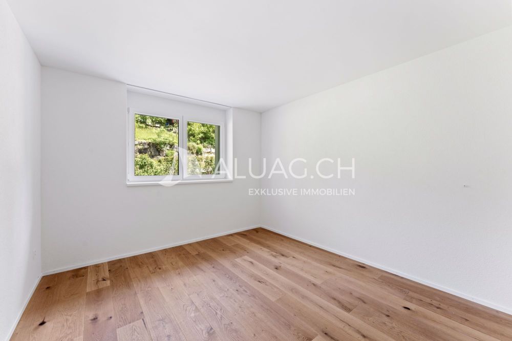NEUBAUTRAUM 4.5 ZIMMER IM HERZEN DER NATUR - Ein weiteres Zimmer mit vielen Einrichtungsoptionen ideal nutzbar als Kinderzimmer oder Gästezimmer