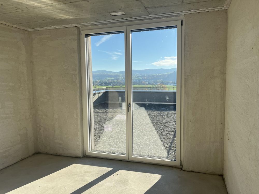 Attikawohnung mit grosser Terrasse inkl. zwei Tiefgaragenparkplätzen an ruhiger Lage. -  Bild 11