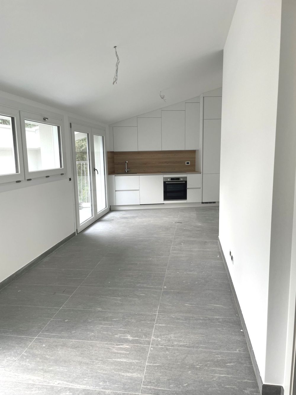 Appartamento all'ultimo piano in zona molto tranquilla e soleggiata - Bild 7