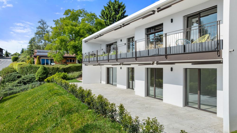 Neuf | Terrasse & jardin avec vue lac -  Bild 4