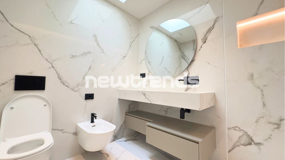 Viganello: 4,5 locali nuovi con vista aperta e parziale lago. - bagno camera padronale