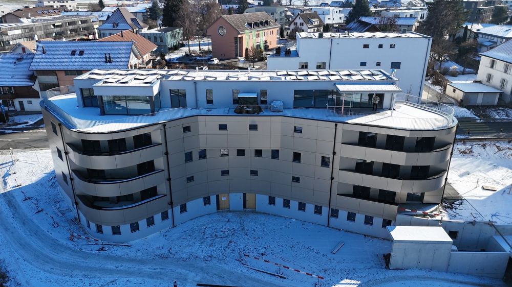 Div Moderne 2.5-4.5-Zimmer Wohnungen mit Balkon und Duplex Attika mit Terrasse in Schmitten - Bild 1