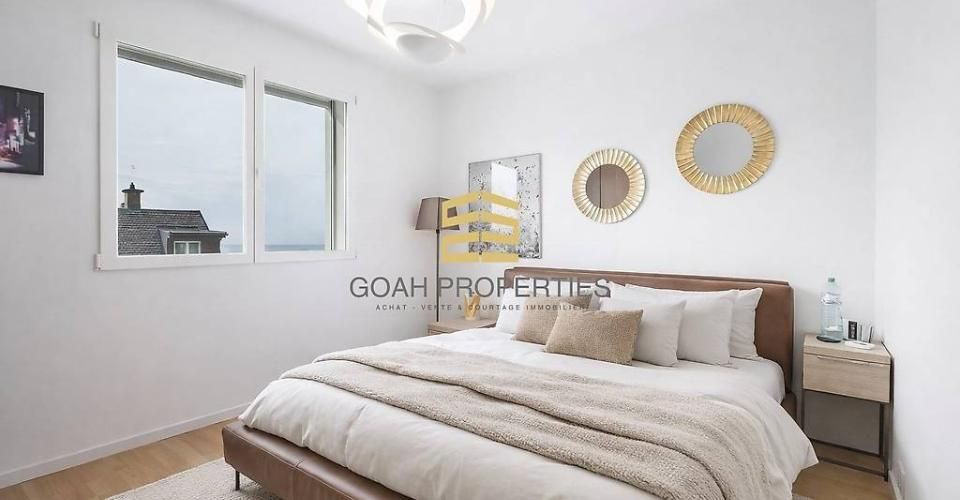 Magnifique appartement de 3,5 pièces avec vue panoramique sur le lac Léman - Appartement 3.5 pièces - image - 2