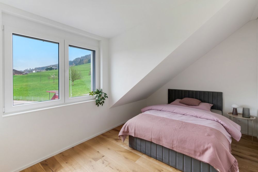 Modernes Doppeleinfamilienhaus mit Garten in Untereggen -  Bild 8