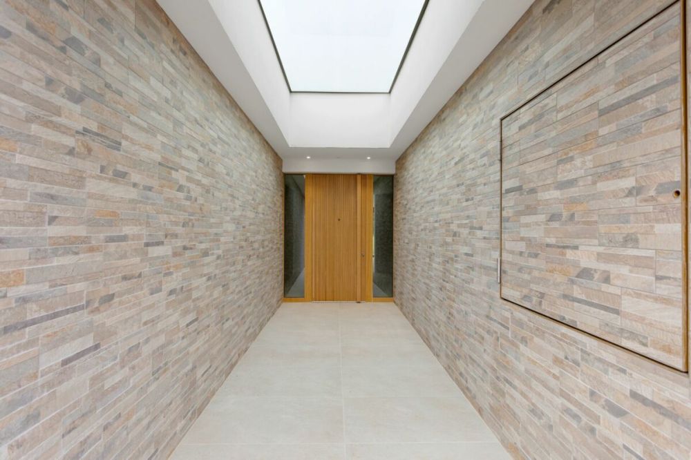 Exklusive Neubau-Villa mit Dachterrasse, Lift und luxuriösem Indoor-Outdoor-Living - Bild 3