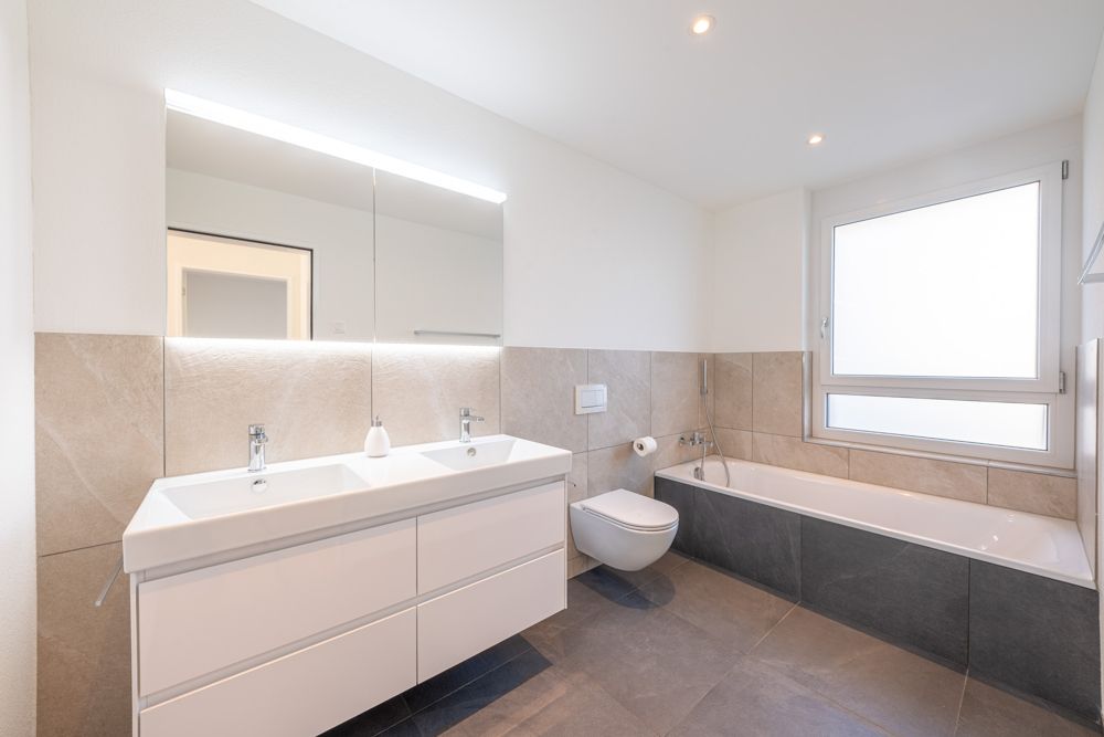 Stilvolle Neubauwohnung mit durchdachtem Wohnkonzept - Badezimmer