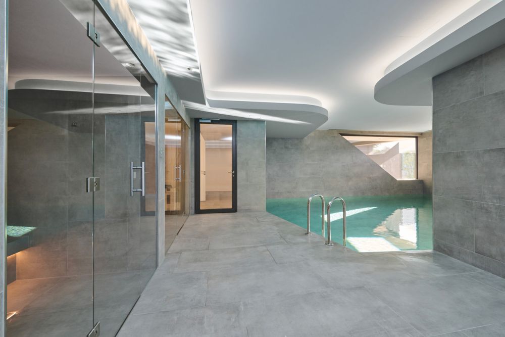 Moderno Appartamento con Ampia Terrazza e Giardino - Bild 9