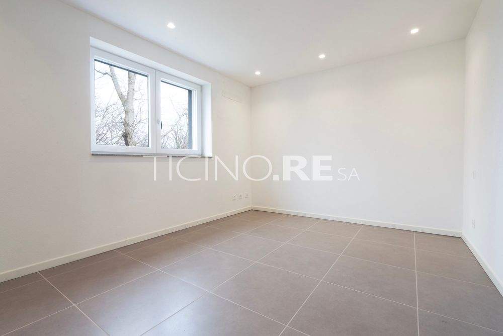 Breganzona – elegante appartamento mai abitato con terrazza privata di 70 m² -  Bild 9