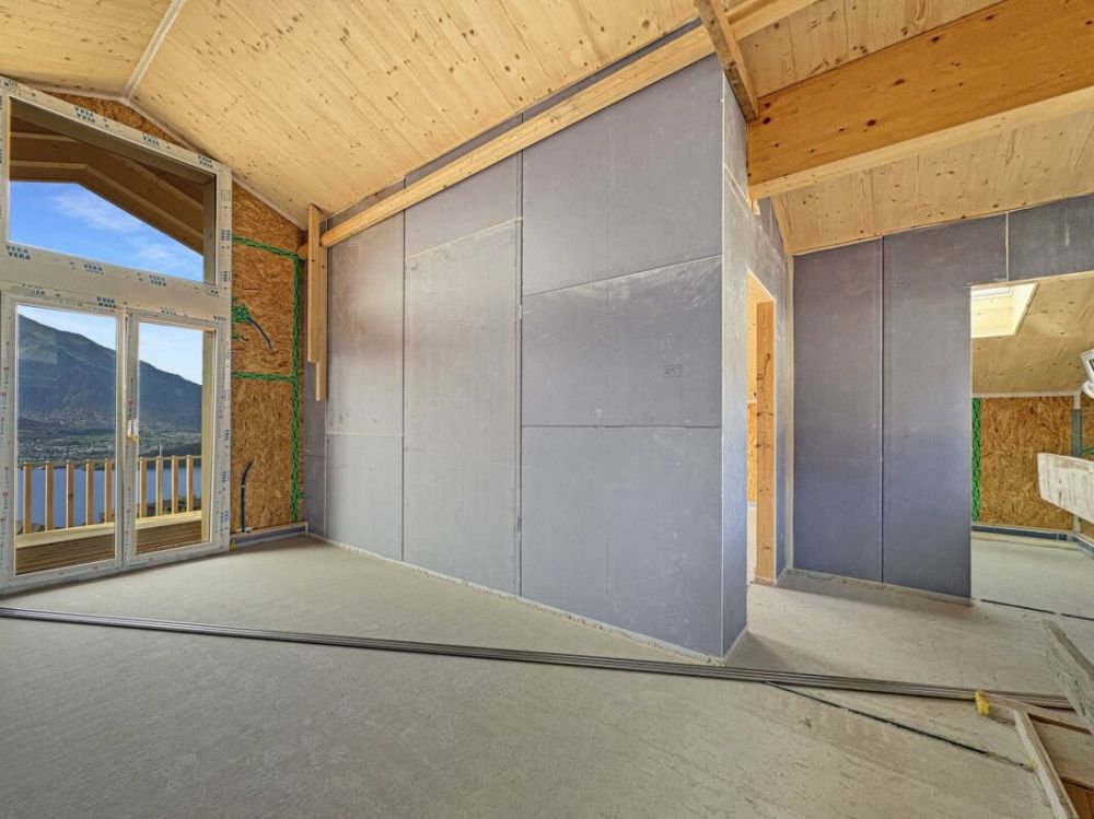 Neubau im Chaletstil, freistehend, modern und mit attraktiver Sicht über den Thunersee in Richtung Niesen und Thun - Bild 13