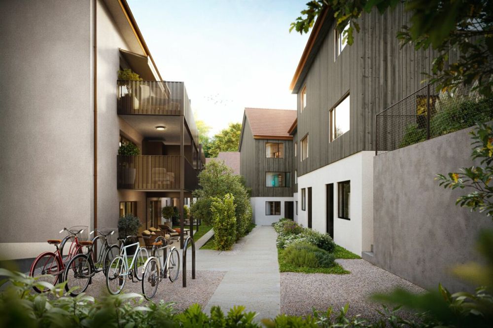 Das eigene Wohnhaus mit Garten: Neubau Am Palmenweg - Zugang zu den Doppel-Einfamilienhäusern via Predigerweg. Lift zur Tiefgarage.