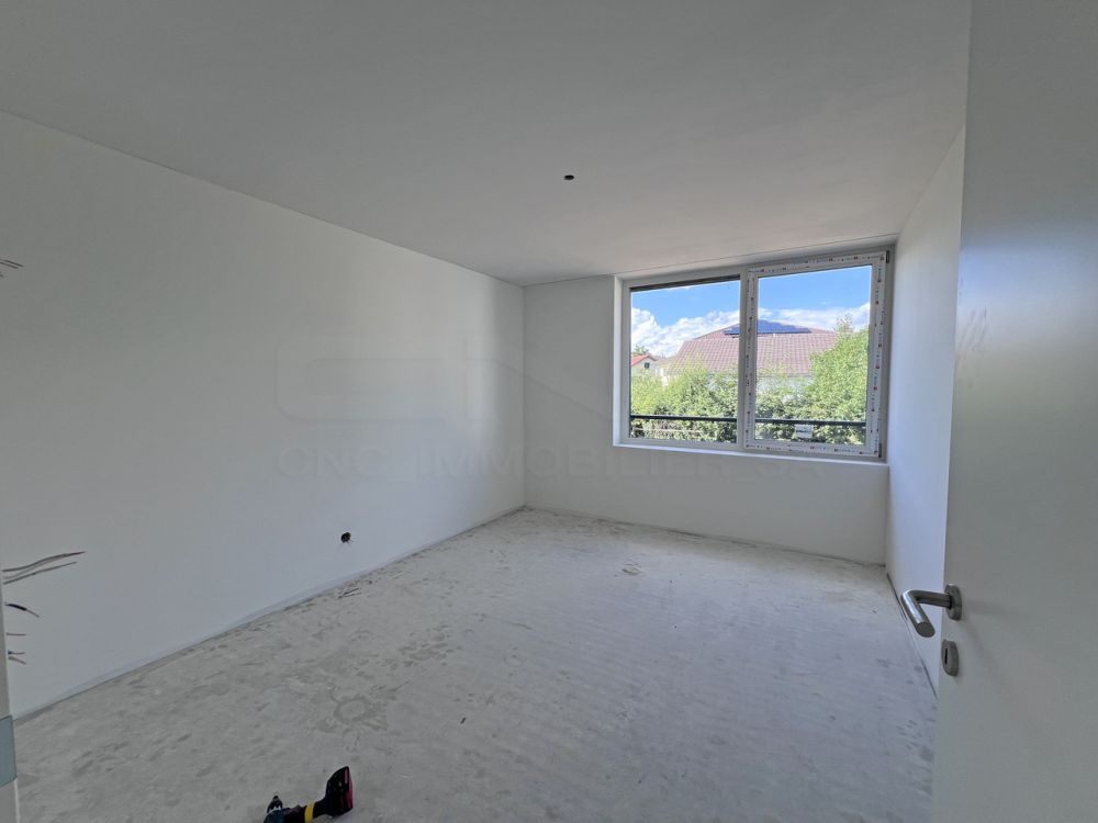 Appartement 4.5 pièces Élégance architecturale à 2 pas du centre-ville - Lot 3 - Chambre à coucher