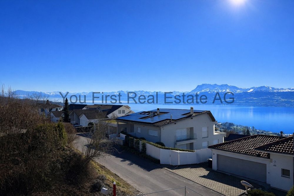 Luxuriöses Wohnen mit Seeblick in Eich  Ein Traum wird wahr! - Panorama-Highlight: Seesicht-Wohnung mit Solaranlage und Bergpanorama