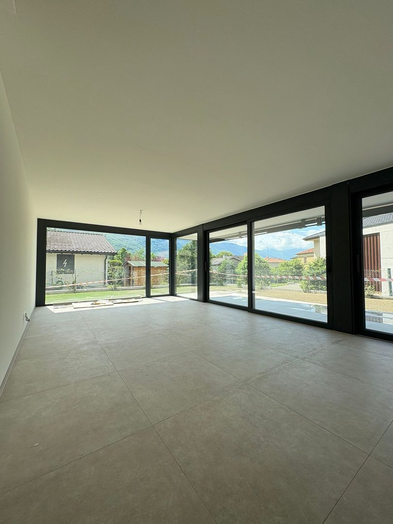 Elegante appartamento di 4.5 locali con giardino privato a Giubiasco -  Bild 2