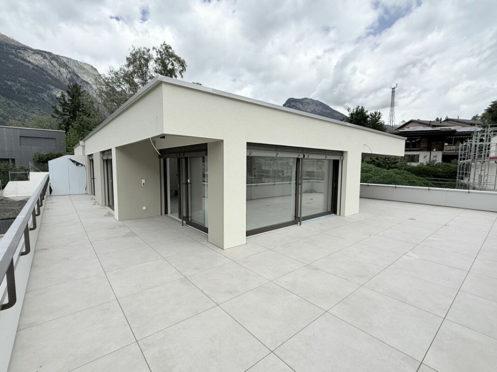 Einzigartige Dach Wohnung mit alpinen Weitblick in Brig und grosser Sonnenterasse -  Bild 1