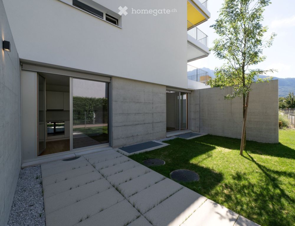 Nuovo e moderno appartamento da 1.5 locali con giardino privato - Bild 5