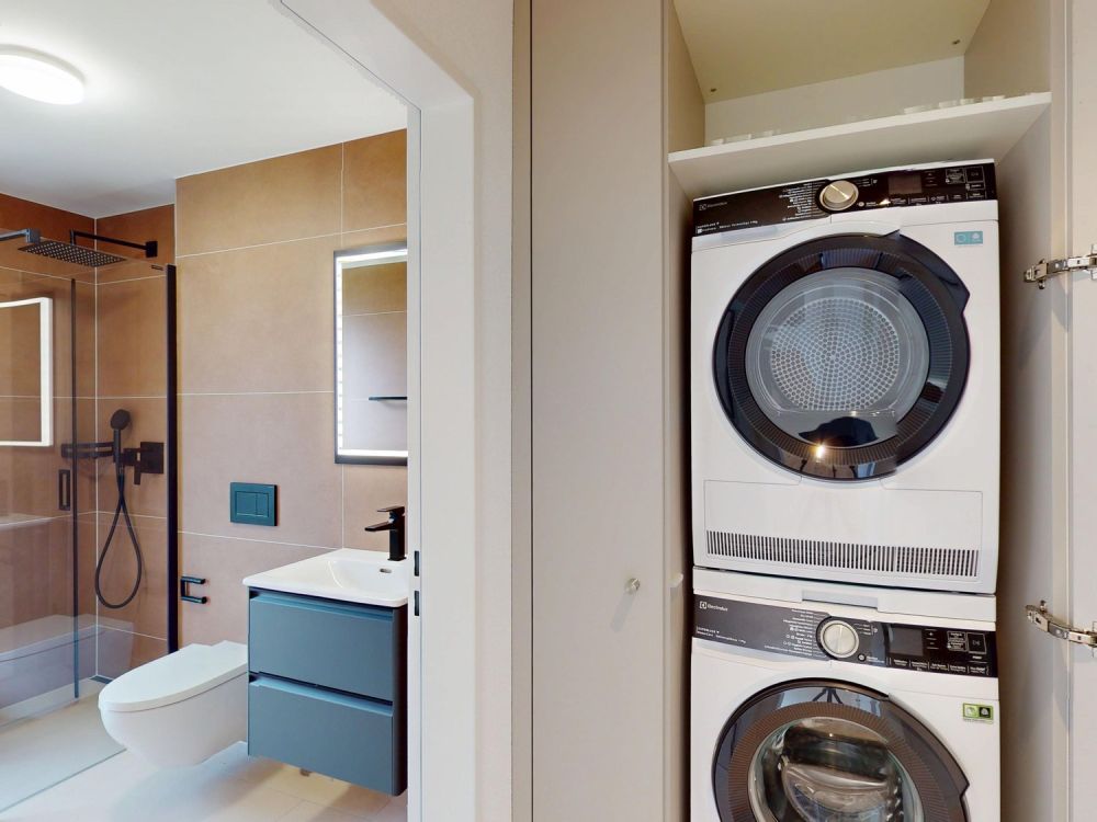 4.5-Zimmer-Gartenwohnung B1 - Modern wohnen an der Langete - Waschturm und Bad mit Dusche