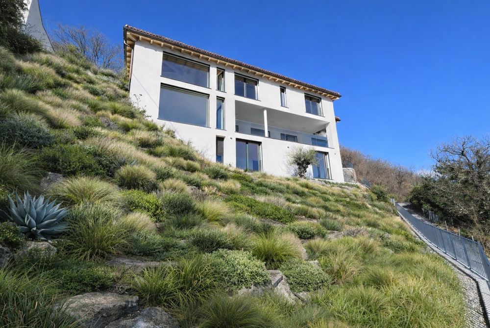 SPLENDIDE VILLA 7.5 LOCALE MIT TRÄUMHAFTER AUSBLICK IN VICO MORCOTE -  Bild 9