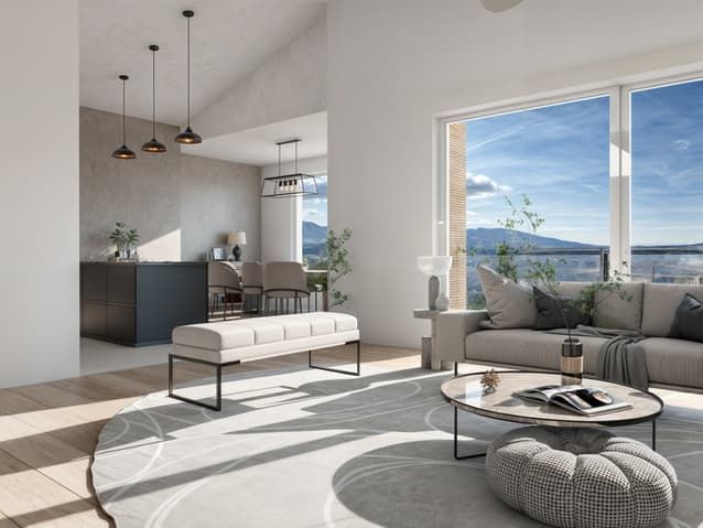MAGNIFIQUE APPARTEMENT NEUF AVEC VUE LAC ET MONTAGNES À BOTTERENS - Un séjour spacieux avec cuisine ouverte et espace repas