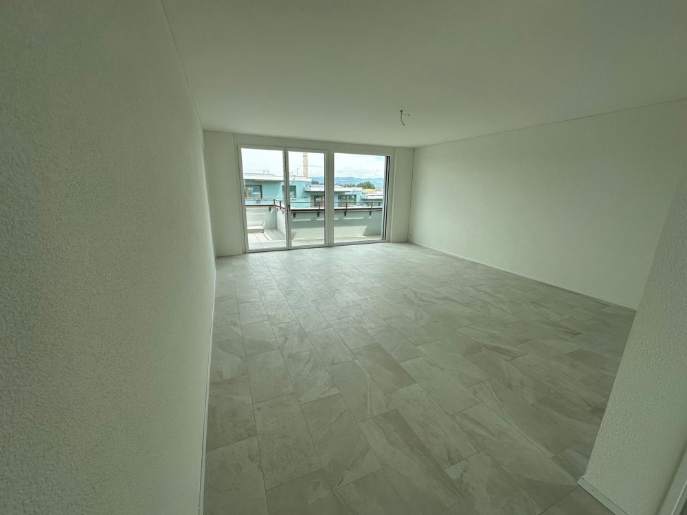 Erstbezug 2026 - Exklusive 3.5-Zimmer-Attikawohnung mit zwei Terrassen - Wohnzimmer