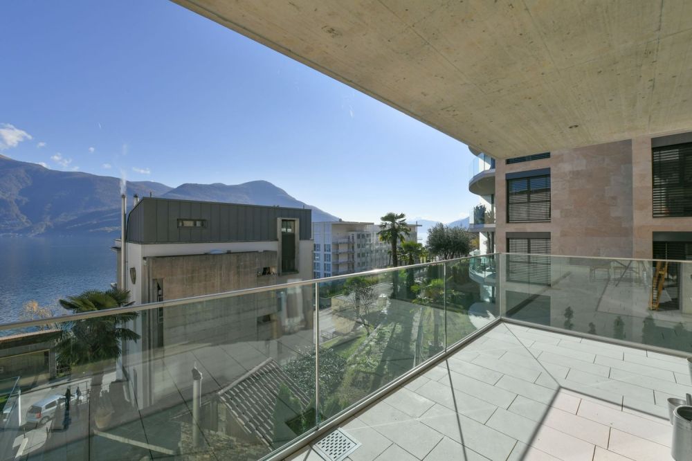 Bellissimo 3.5 locali moderno con parziale vista lago -  Bild 3