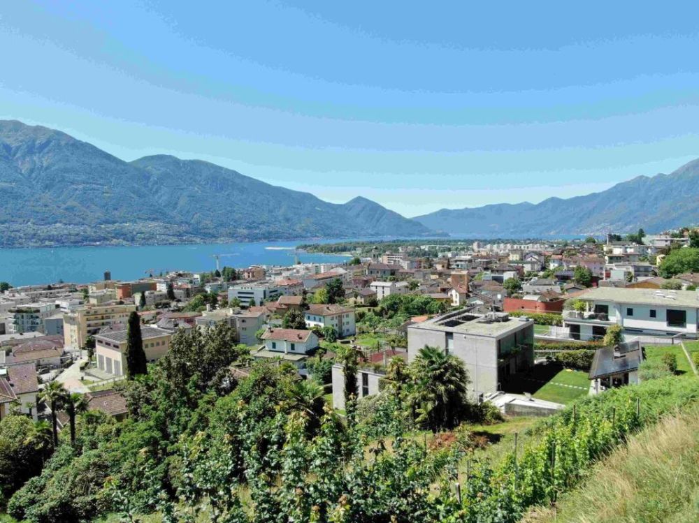 Magnifico attico da sogno con vista lago, wellness e piscina - Bild 7