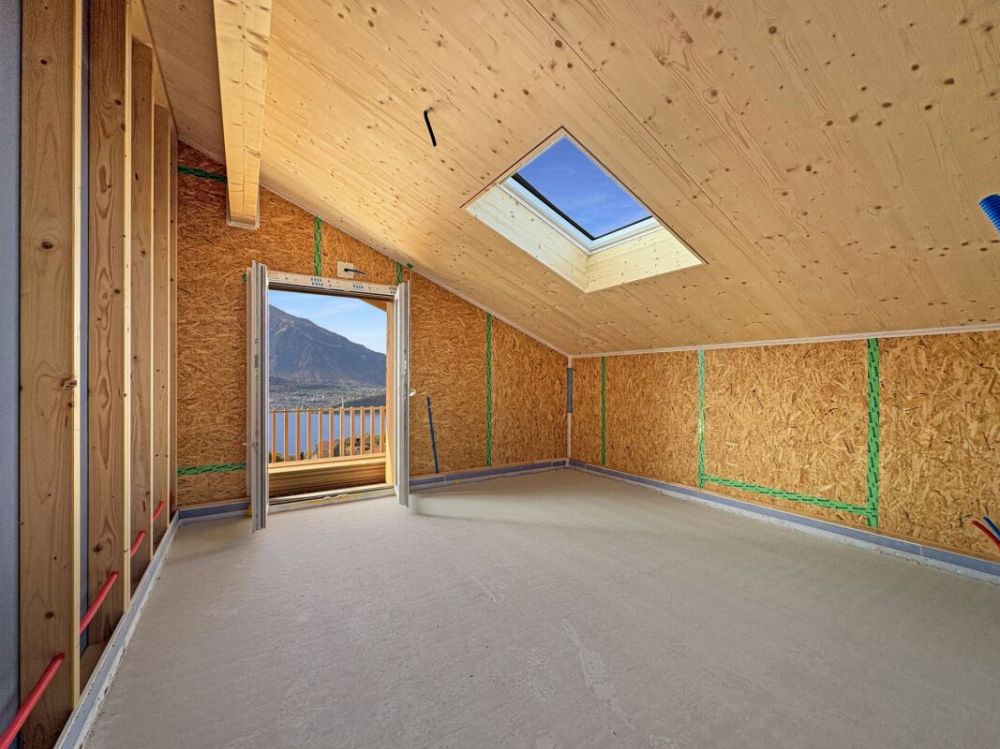 Neubau im Chaletstil, freistehend, modern und mit attraktiver Sicht über den Thunersee in Richtung Niesen und Thun - Bild 7