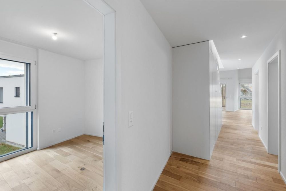 Entdecken Sie eine außergewöhnliche Wohnung, die Komfort, Raum und atemberaubende Aussicht auf die Alpen bietet. -  Bild 10