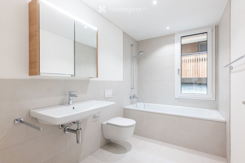 Moderne 5.5 Zimmer Eigentumswohnung mit grossem Sitzplatz -  Bild 11
