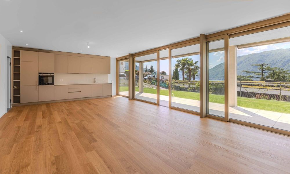 STUPENDO E MODERNO 2.5 CON GIARDINO E VISTA LAGO A BISSONE -  Bild 6