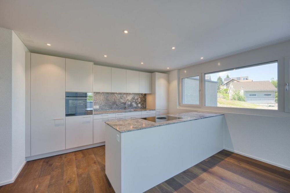 NEUBAU - 3.5 Zimmer-Wohnung mit 310 m2 Gartenanteil -  Bild 1