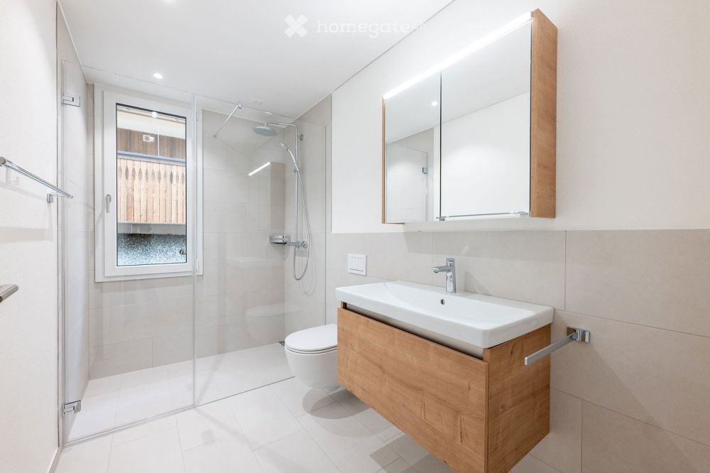 Moderne 5.5 Zimmer Eigentumswohnung mit grossem Sitzplatz -  Bild 5