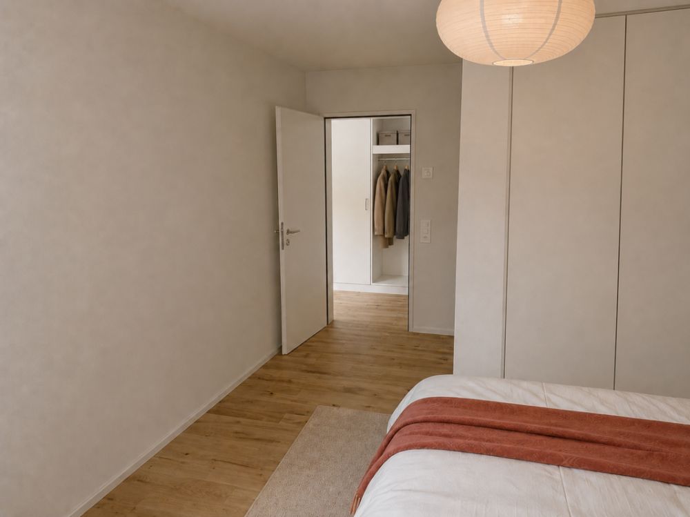 Zentrale Lage und 17.8 m² überdachte Terrasse als erweitertes Wohnzimmer - Schlafzimmer, Garderobe, Gang im Neubau