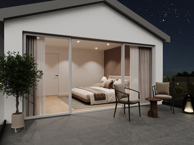 Magnifique maison individuelle à Courfaivre JU - Spacious bedroom with large windows, sliding glass doors leading to a balcony or terrace, hardwood flooring, and modern furniture including a bed, chairs, and side tables.