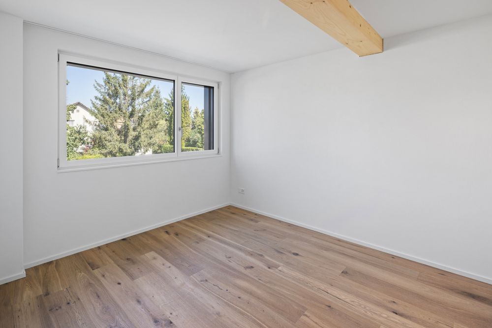 Exklusiver 5.5-Zimmer-Hausteil mit modernem Wohnkonzept - Schlafzimmer 1. OG