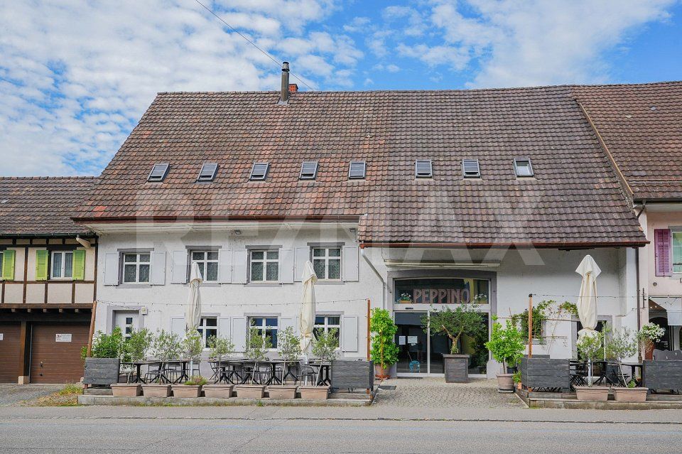 Ideal zentral: Voll vermietetes Wohn- und Geschäftshaus mit Nutzungsreserve -  Bild 1