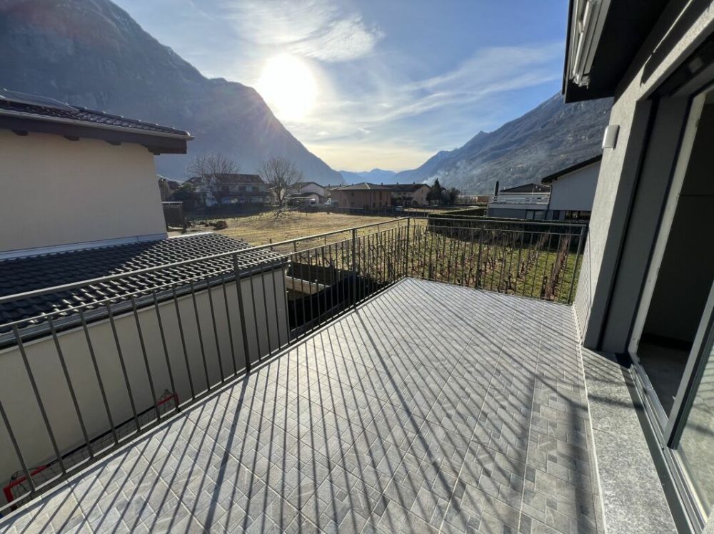 Moderna casa bifamiliare individuale, di 4.5 +3.5 locali con ampio giardino - Bild 12