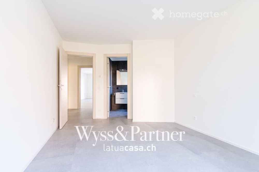 Claro - nuovo appartamento 3.5 con giardino - Bild 4