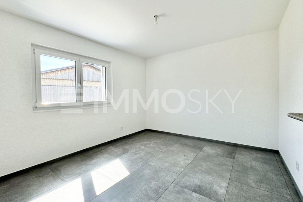 Appartement neuf 3.5 pces en rez de jardin à 5 min. de Delémont - Chambre lumineuse